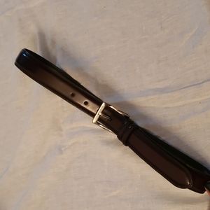 Dark patent leather belt